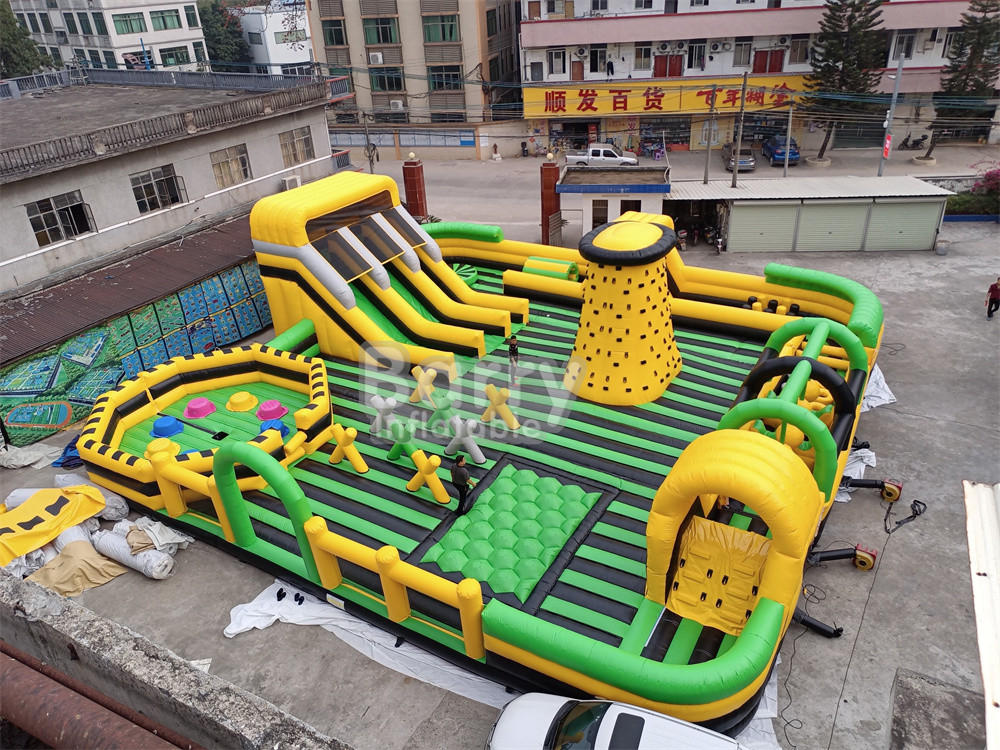 विशाल आउटडोर पानी सूखी inflatable थीम पार्क राष्ट्रीय इनडोर बड़े उछाल घर के साथ वाइप आउट खेल स्लाइड चढ़ाई दीवार